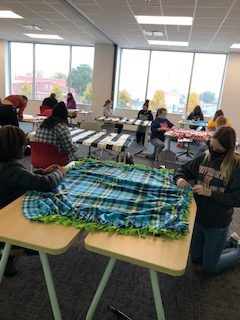 Students creating blankets